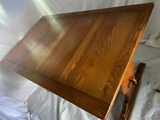 An Ercol Extendable Dining Table with 6 Windsor Goldsmith 369 Spindle Back Chai