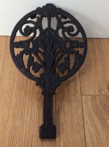 Ornate cast iron - , trivet