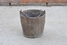 old vintage wooden rice bucket