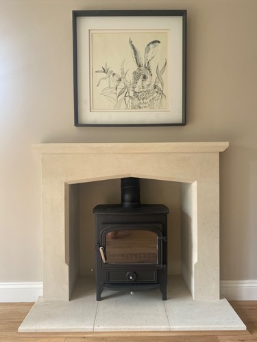 Stone fireplace hand carved - hand,