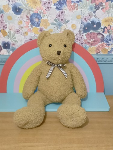 Classic teddy bear with bow-by
