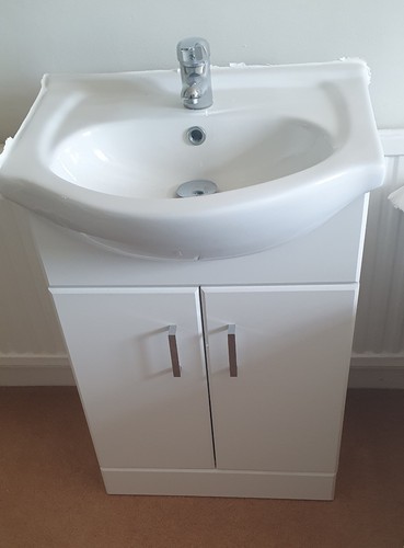 Unused small white sink - small,
