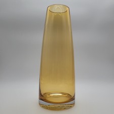 A tall honey-amber Scandi art