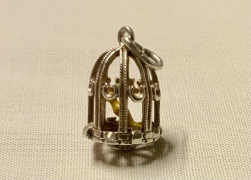 Vintage bird cage with yellow - bird,