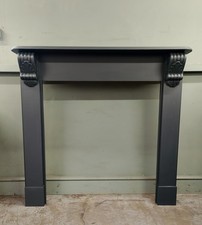 A Lovely Wooden Fireplace Mantle Surround