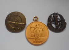 Archery   medal  and two badges APOLLO TOURNAMENT   1ST HEREFORD  ect         C
