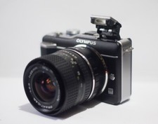 28mm= lens 50mm  f.2.8 on