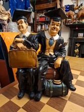 Vintage 1980s Resin Graduation Attire Laurel & Hardy Seated Wth Luggage Ornament