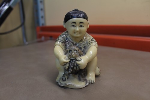 Japanese netsuke woman and - and, dog