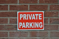 PRIVATE PARKING sign or