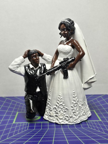 Bride holding machine gun - holding,