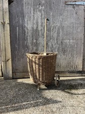 Vintage wicker shopping basket log storage trolley wheels