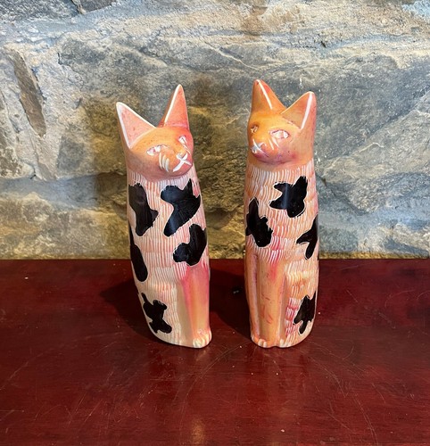 Pair hand carved and - carved,