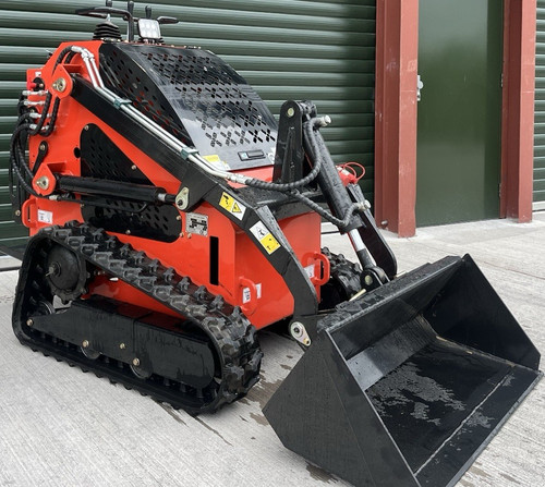 Red compact tracked skid steer - tracked,