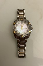 Seiko Velatura Quartz Ladies Diamond  with 2 tone strap. White mother of pearl