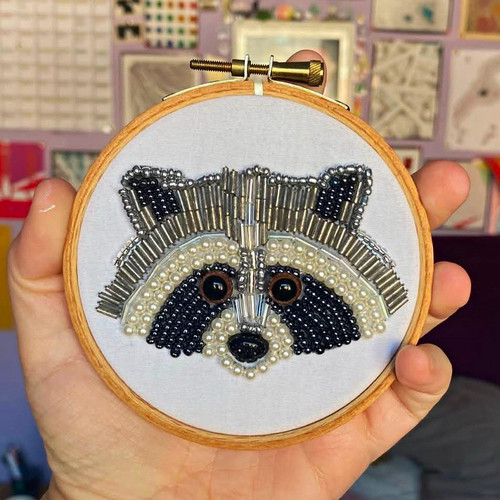Multicoloured raccoon bead - multicoloured,