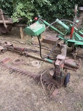 Mc Connel power arm model u ith hedge cutter saw bench and mower