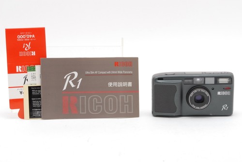 Read near mint - ricoh, gray