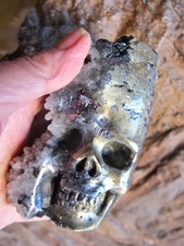 Chalcopyrite carved skull with