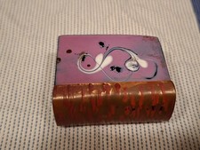 enamelled matchbox holder