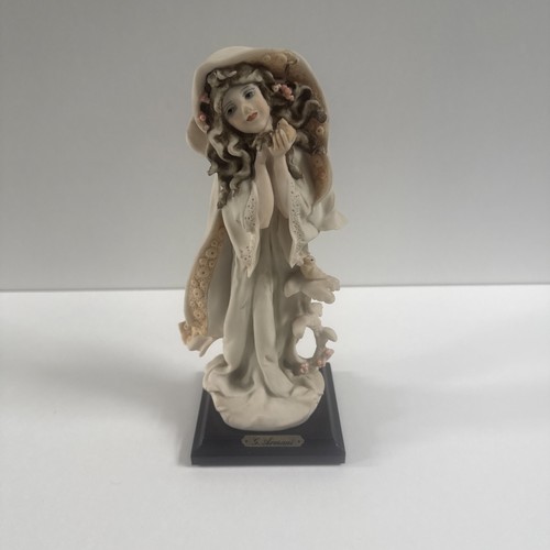 Armani figurine four - ,