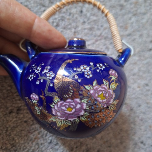 Miniature east asian - miniature,