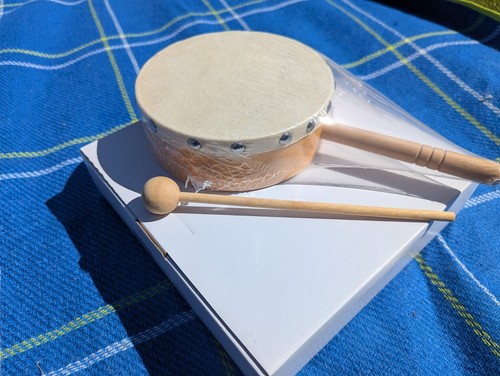 Tom boy hand drum with - hand,