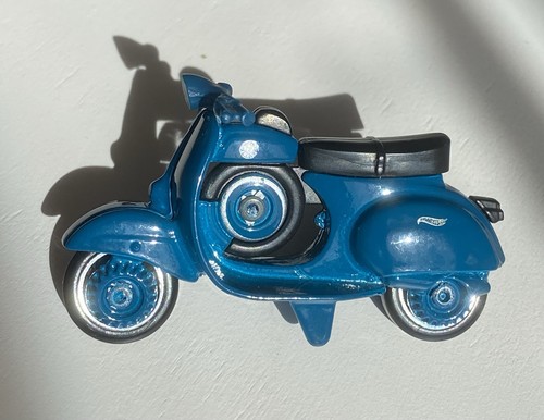 Blue vespa style scooter - blue,