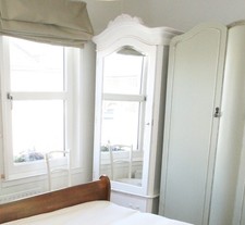 White ornate vintage French style armoire wardrobe 