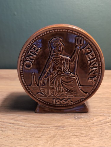 One penny glazed - one, money