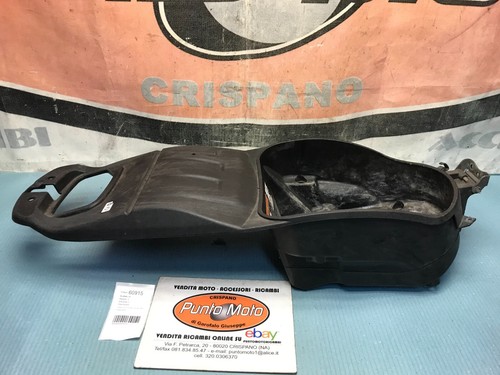 Fairing under seat compartment