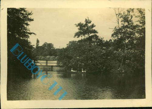 Men rowing boat on lake - men,