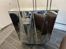 Indoor Bar made of Mirrored Sides and Black interior 