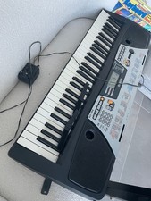 Yamaha PSR-175 Keyboard with stand and book