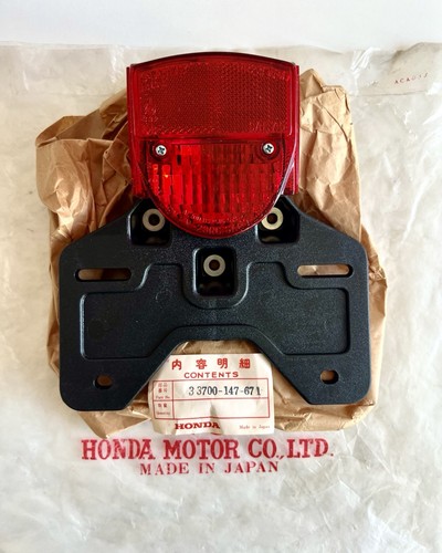 Nos tail light plate holder - tail,