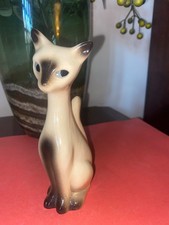 Vintage Sitting Down Siamese