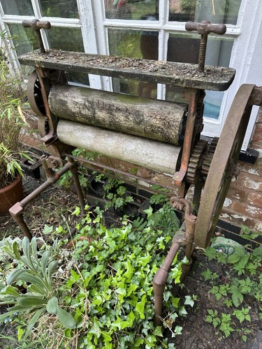 Antique mangle garden ornament - mangle,