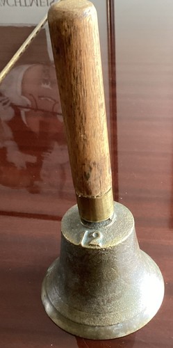 Antique bronze hand bell - hand,
