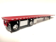 DCP  FIRST GEAR 1/64 SCALE  WILSON  FLATBED  TRAILER  RED, BLACK, SPREAD AXLE