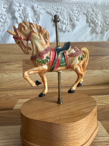 Two vintage carousel - two, horses