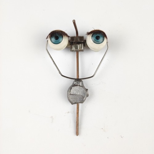 Antique doll sleepy eyes