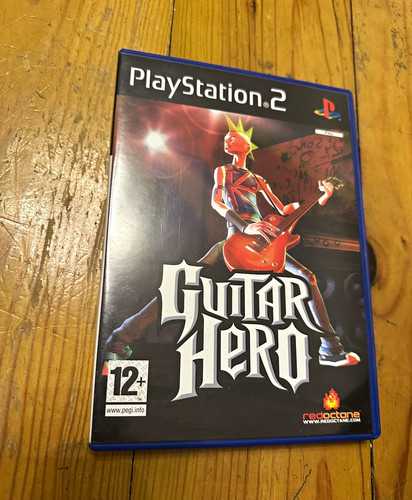 Guitar hero ps2 - pegi, 12
