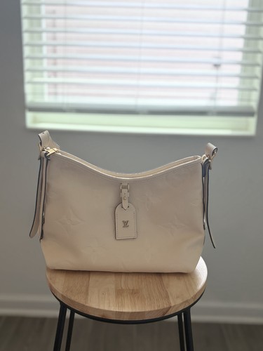 Louis vuitton carryall - louis, pm