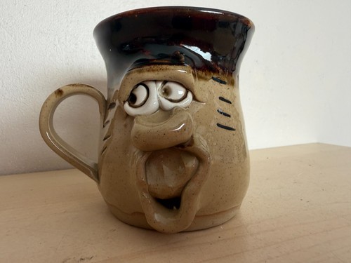 Pretty ugly pottery face cup - face,