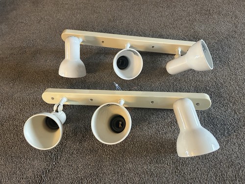 Pair ceiling track swivel - of,