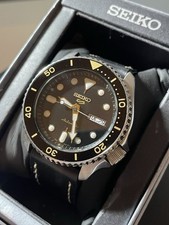Seiko 5 Sports Black dial with Gold accent & Leather Strap