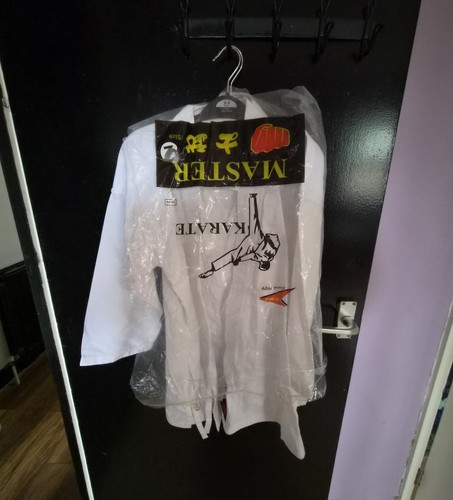 Brand new white martial - white,