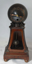 Junghans 7 day    globe clock in good working conditon with key