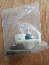 Nissan Primera P11,LH wiper pivot,new in pack genuine part.Model Years 96-99.