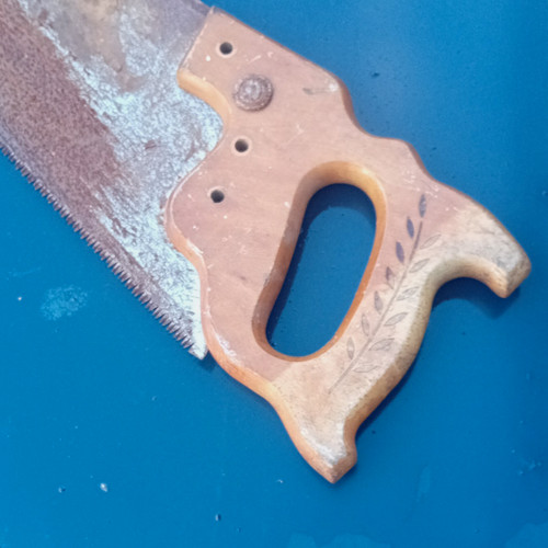 Vintage hand saw with wooden - with,
